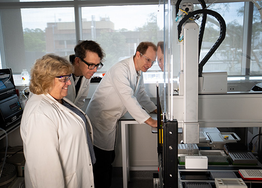 L R Professor Erica Wanless Professor Alister Page Dr Robert Chapman in a University of Newcastle lab