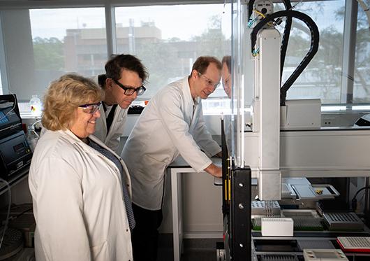 L R Professor Erica Wanless Professor Alister Page Dr Robert Chapman in a University of Newcastle lab