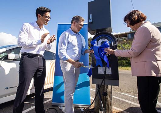australian electric vehicle supply equipment brendan wheeler the hon pat conroy mp and lake macquarie mayor kay fraser unveil electric vehicle charger