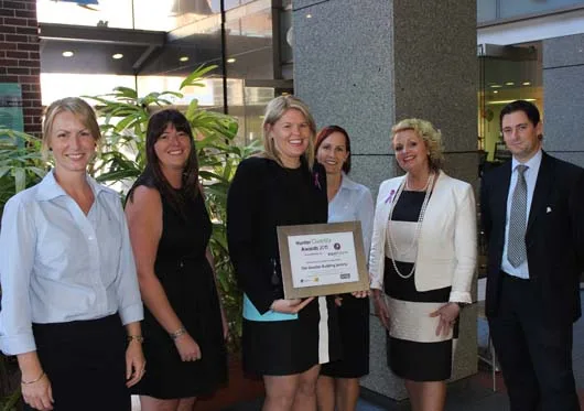 Greater-Building-Society-head-of-people-Kristy-Bagnall-holding-Hunter-Diversity-Award-with-colleagues