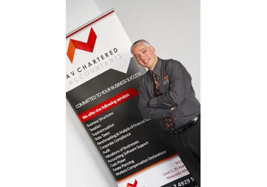 Tony-Vidray-with-banner